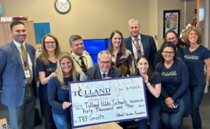 40K Check being presented to Tolland Public Schools by TEF directors